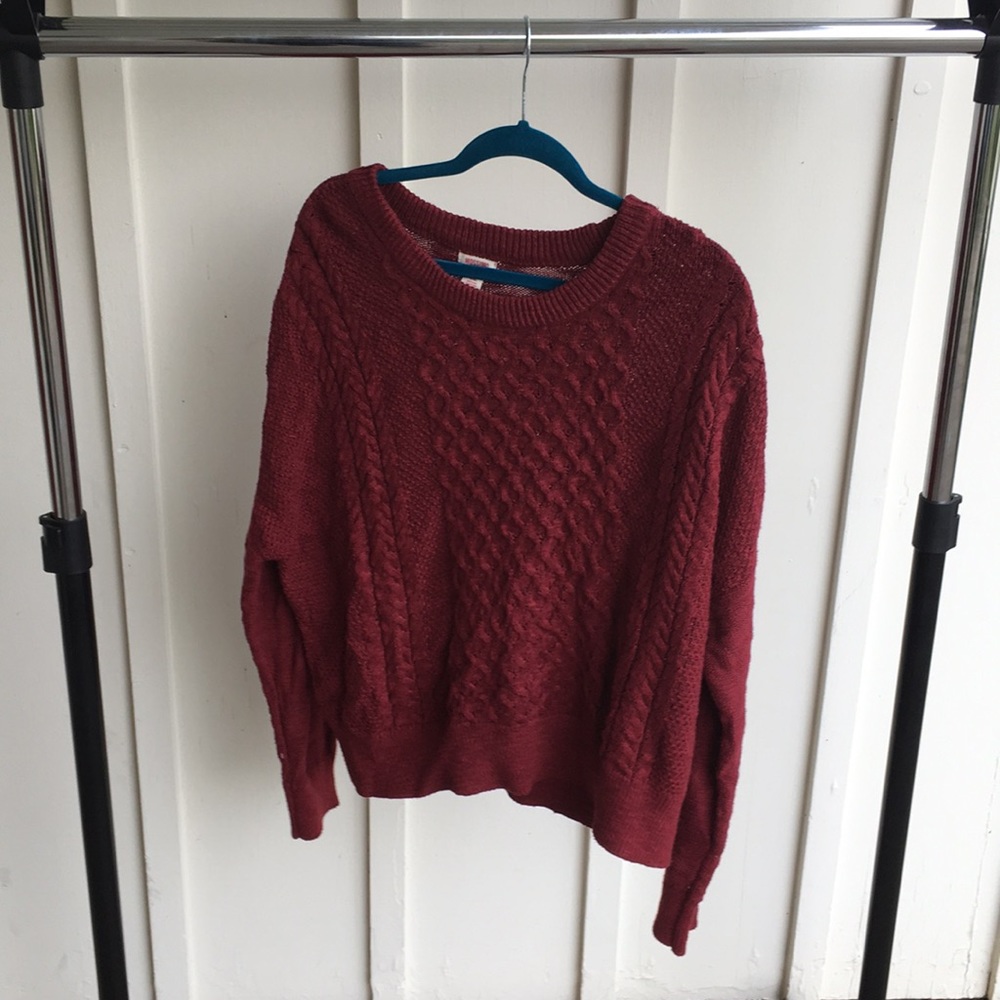 Red cable knit sweater